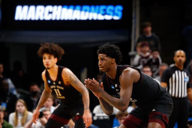 Mar 24, 2024; Memphis, TN, USA; Texas A&M Aggies forward Solomon Washington (13) claps as he defends during over time against the Houston Cougars in the second round of the 2024 NCAA Tournament at FedExForum. Mandatory Credit: Petre Thomas-USA TODAY Sports