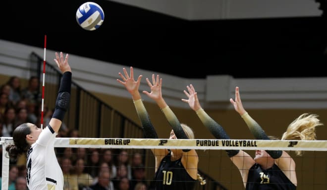Purdue Boilermakers Eva Hudson (17) spikes the ball during the NCAA women s volleyball match against the Central Florida Knights, Thursday, Sept. 14, 2023, at Holloway Gymnasium in West Lafayette, Ind.