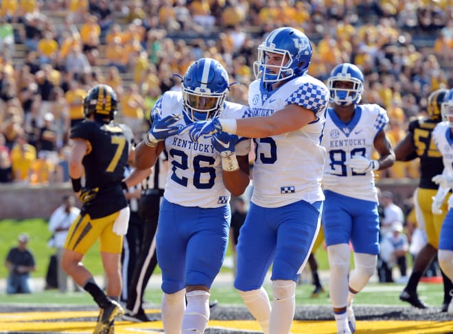 Greg Hart celebrates with Benny Snell after paving the way for a rushing touchdown against Missouri (Denny Medley/USA Today Sports)
