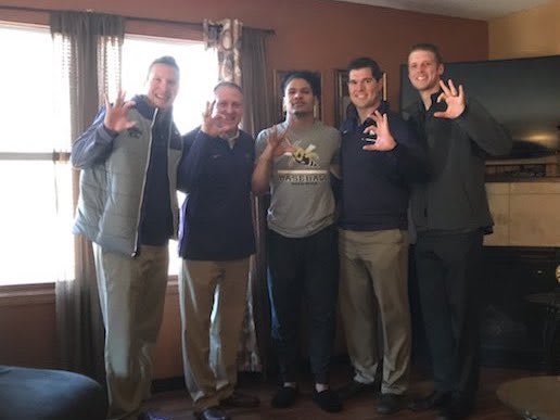 Kansas State coaches on an in-home visit with Price in December.