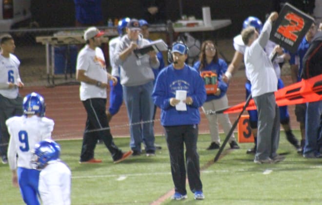Sunnyside head coach Glenn Posey on the sidelines during a road playoff game in 2014.  He led the Blue Devils to three playoff appearances in five seasons at his alma mater.