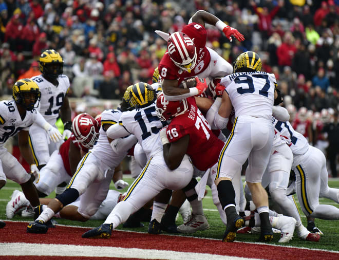 Indiana running back Stevie Scott dives over the goal line for a one-yard score against Michigan. 