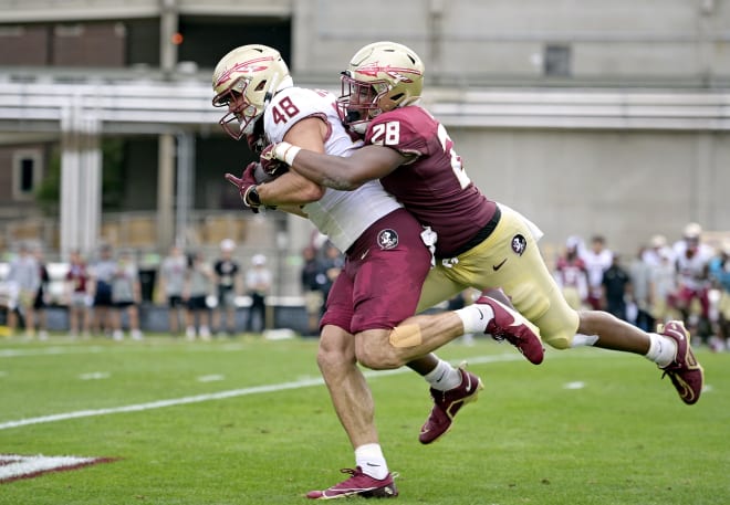 Justin Cryer, making a tackle in the spring showcase, feels comfortable ahead of year 2 at FSU.