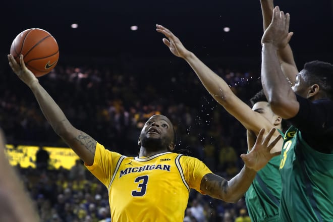 Zavier Simpson is averaging career highs in points and assists.