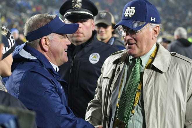 Notre Dame director of athletics Jack Swarbrick (right) with football coach Brian Kelly (left)