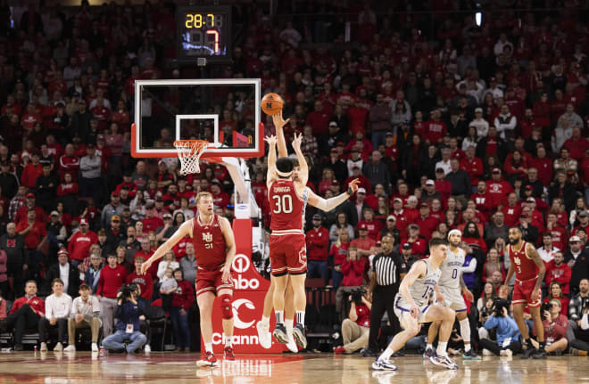 Keisei Tominaga's shot over the outstretched hand of Matt Nicholson sealed the 75-69 win for Nebraska.