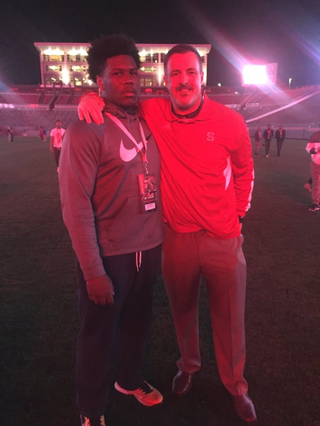 McNeill met new defensive line coach Kevin Patrick Saturday night at NC State.