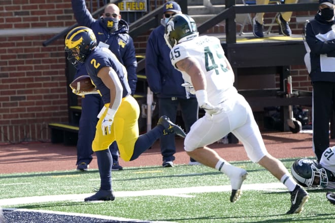 Michigan Wolverines football running back Blake Corum scored two touchdowns against Michigan State in 2020.