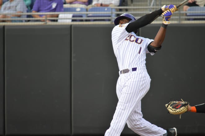 ECU's Dwanya Williams-Sutton slugs a first of two home runs in the Pirates' final home game of the regular season.