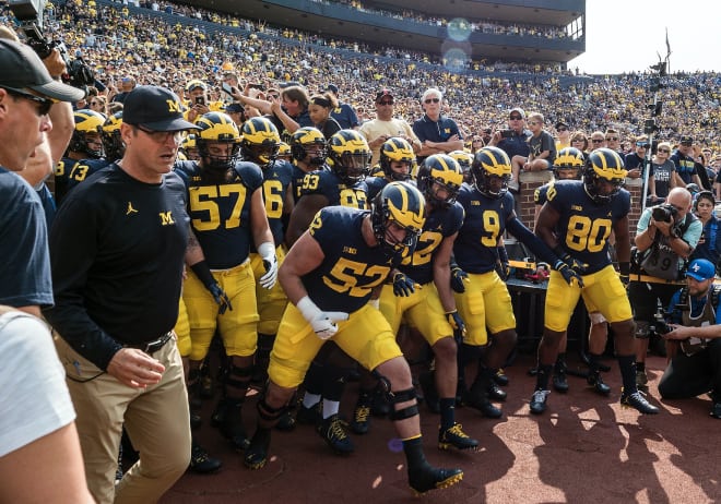 Jim Harbaugh and Michigan will open the season at Notre Dame in South Bend Sept. 1.