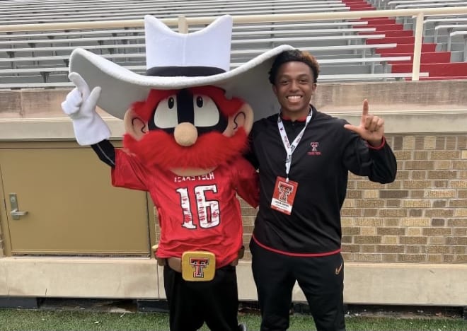 Jordan Sanford with Raider Red