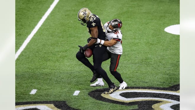 Antoine Winfield Jr. forces a fumble on Sunday versus the Saints. (Photo: buccaneers.com)