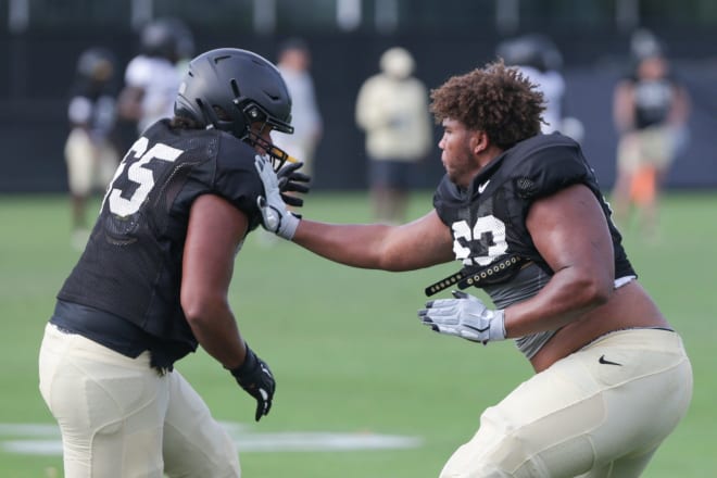 The staff likes the potential of 6-5, 305-pound true freshman offensive lineman Marcus Mbow (right).
