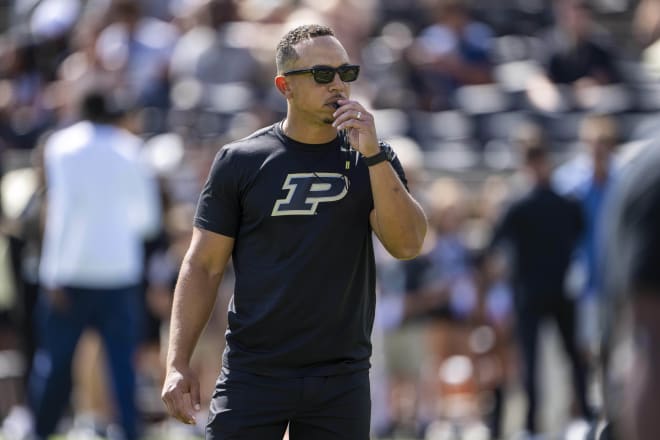 Sep 14, 2024; West Lafayette, Indiana, USA; Purdue Boilermakers head coach Ryan Walters walks on the field during warm ups before a game against the Notre Dame Fighting Irish at Ross-Ade Stadium. Mandatory Credit: Marc Lebryk-Imagn Images