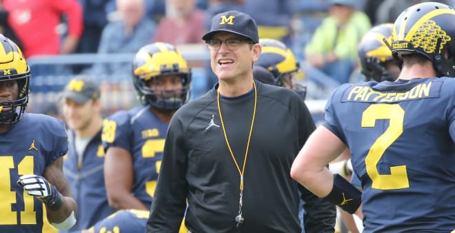 Michigan Wolverines head football coach Jim Harbaugh has posted 10-3 records in three of his first four years at Michigan.
