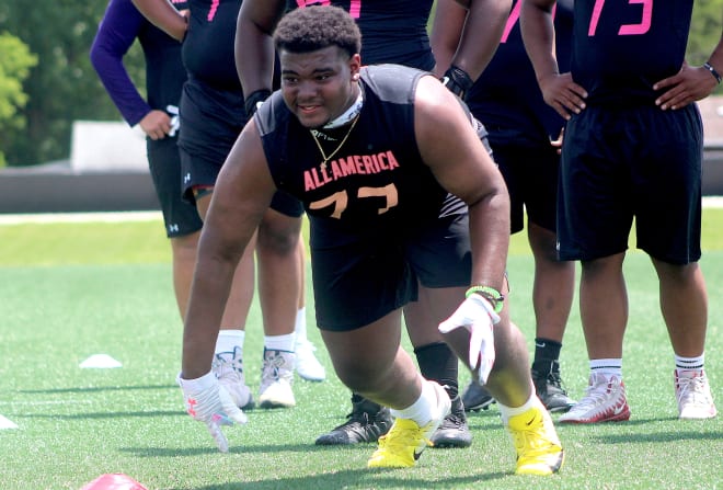 Ohio defensive tackle Derrick Shepard holds a Michigan Wolverines football recruiting offer from Jim Harbaugh.