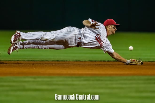 Madison Stokes dives for a ground ball in the first inning.  South Carolina won 4-3.