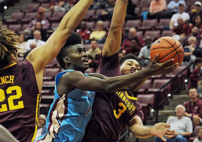 Freshman forward Jonathan Isaac drives in for a basket in his team's win over Minnesota on Monday.
