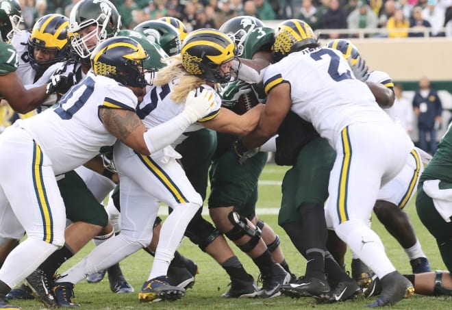 The Michigan Wolverines football defense locks down Michigan State in 2018. 