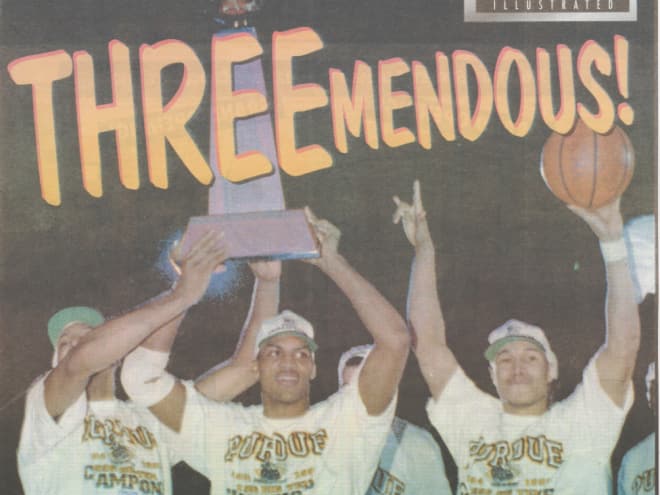 Justin Jennings hoists the Big Ten title trophy after the 1996 "Three-Pete."