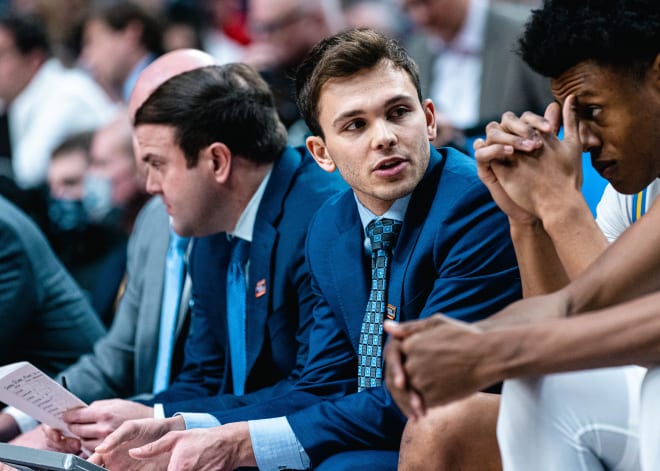 Nate Georgeton was officially promoted to assistant coach Tuesday in a series of moves announced by the UCLA men’s basketball program.
