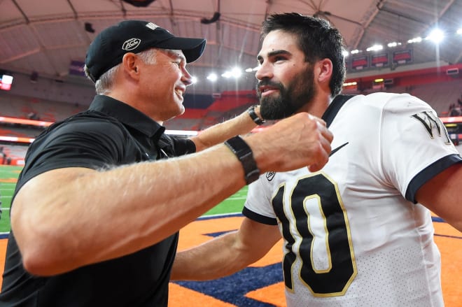 Dave Clawson, left, and the rest of Wake's football program is happy to embrace the return of Sam Hartman. 