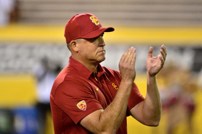 USC football coach Clay Helton is trying to keep structure for his team while players and coaches are home per coronavirus precautions.