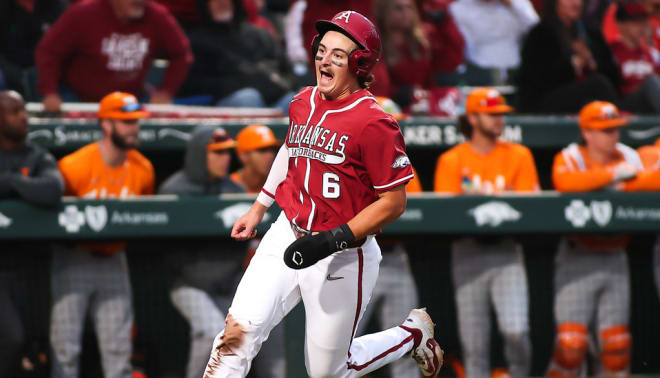 Caleb Cali runs home during Arkansas' 6-3 win over Tennessee on April 15. 