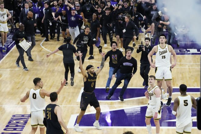 Northwestern fans stormed the court the minute the buzzer sounded to celebrate the huge upset