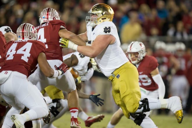 Quenton Nelson said Sunday that he will be back with Notre Dame in 2017;
