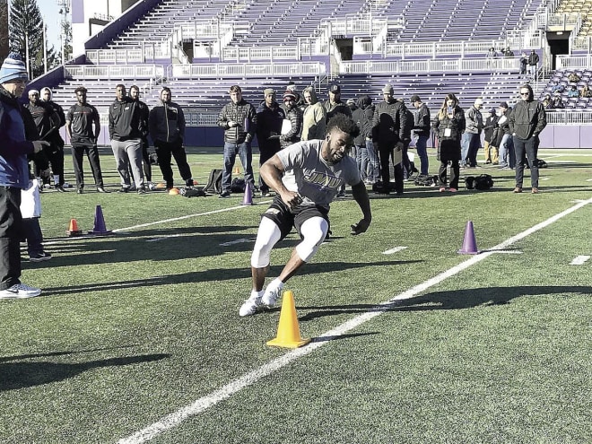 Former James Madison safety Raven Greene runs the three-cone drill in front of scouts at his pro day on Friday at Bridgeforth Stadium in Harrisonburg.
