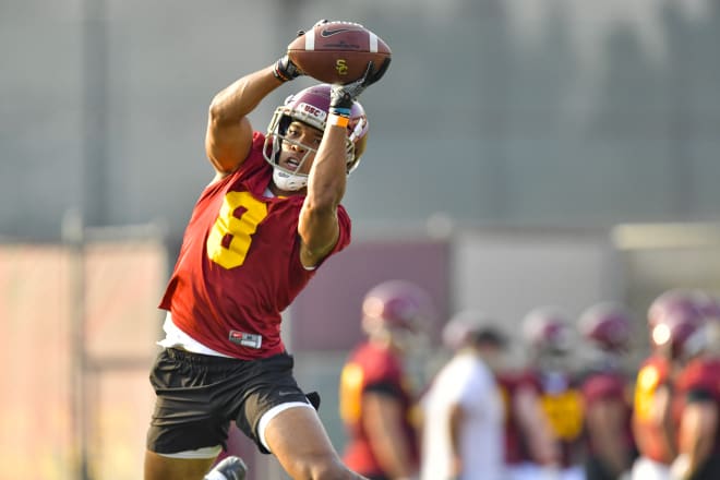 Junior receiver Amon-Ra St. Brown looks to be a man on a mission entering his third season with the Trojans. He makes this catch Friday during the first practice.