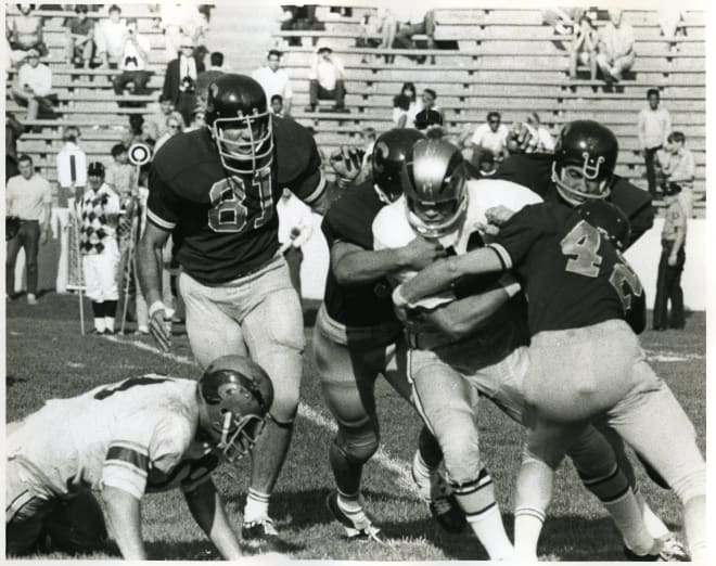 Anderson is wrestled to the ground by Bears defenders during a 10-0 loss at California on Sept. 28, 1968.