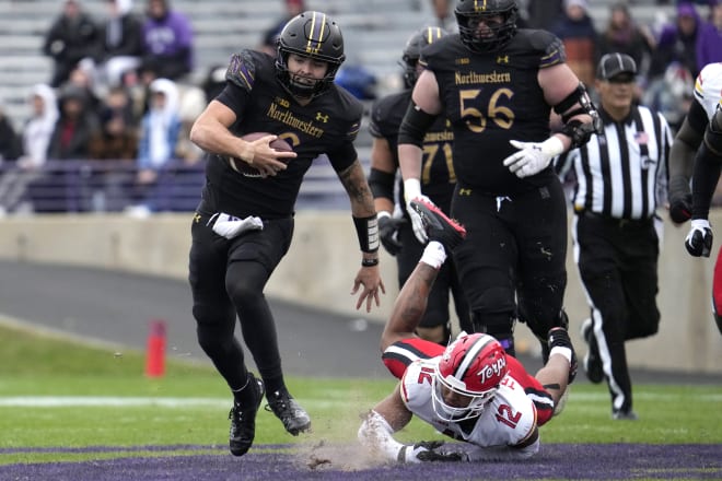 Current No. 1 quarterback Brendan Sullivan sheds a Maryland tackler last season.