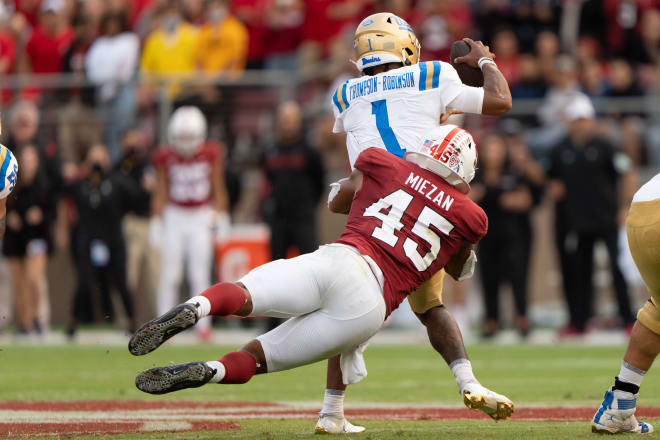 Stanford linebacker Ricky Miezan with a near sack against UCLA 