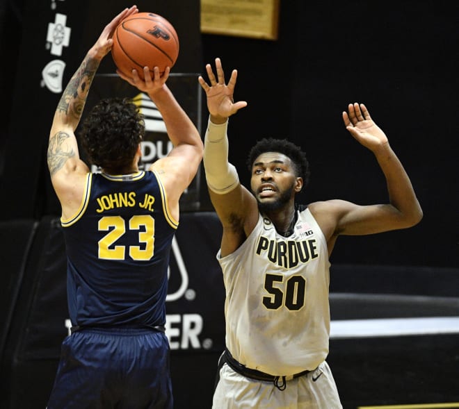 Michigan Wolverines basketball's front line, including Brandon Johns, held Purdue's Trevion Williams to 14 points on 6-of-19 shooting in January.