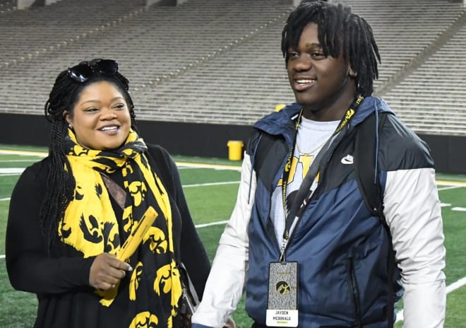 Jayden McDonald with his mother, Kristi, at Iowa's spring game in April.