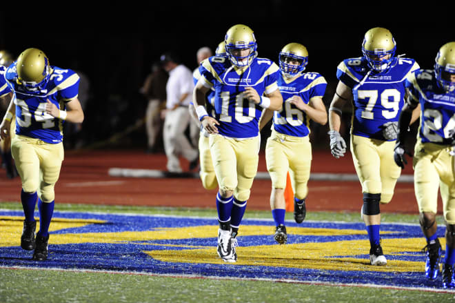 FSU quarterbacks coach Tony Tokarz is shown during his playing days at Division-III Worcester State.