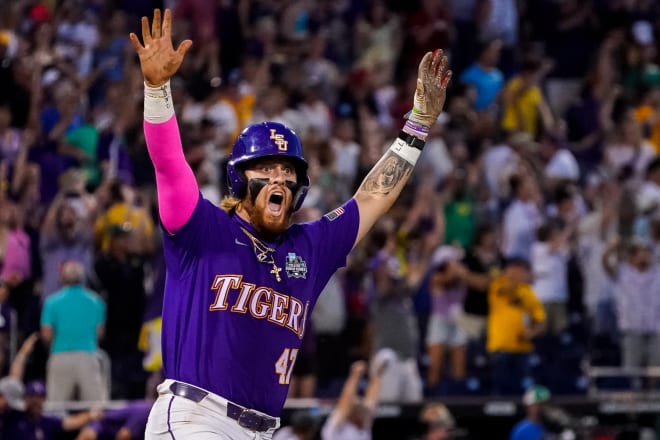 LSU third baseman Tommy White celebrates his two-run walk-off homer in the bottom of the 11th inning that gave the Tigers a 2-0 College World Series win over Wake Forest on Thursday night in Omaha. The victory advanced the Tigers to the championship finals series vs.Florida that starts Saturday night.