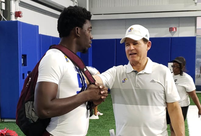 Jones talked with Les Miles after the camp on Friday night