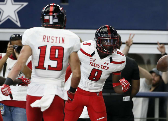 Tony Brown (8) celebrates his touchdown as a freshman against Baylor, which was his lone TD during his career with the Red Raiders
