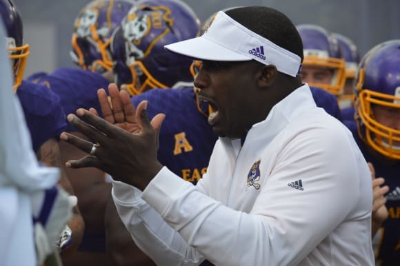 ECU Coach Scottie Montgomery and the Pirates hit the road in AAC play this Sunday at Connecticut.
