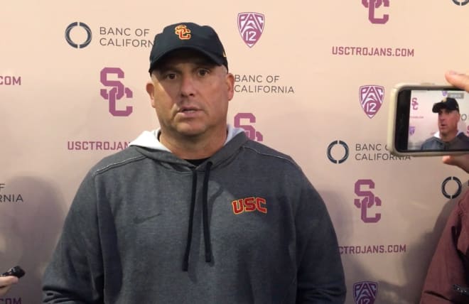 USC coach Clay Helton speaks after practice Tuesday.