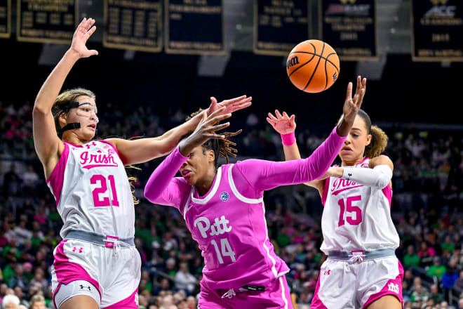 Irish gorwards Maddy Westbeld and Nat Marshall double team Pitt's Jala Jordan in Sunday's Irish win.