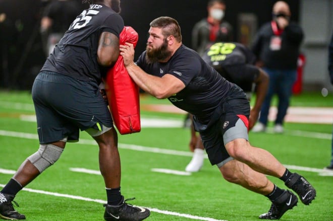 Ben Cleveland executes a blocking drill at Georgia's pro day. (Rob Davis/UGA Sports Communications)