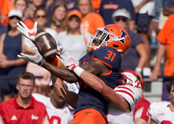 Illinois defensive back Devon Witherspoon steps in front of and breaks up a pass intended for Nebraska wide receiver Oliver Martin late in the second half of an NCAA college football game Saturday, Aug. 28, 202, in Champaign, Ill.
