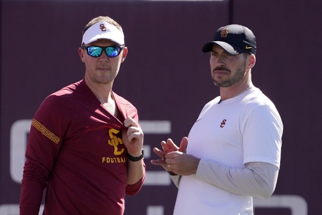 Alex Grinch, right, will return for his second season as USC's defensive coordinator and his fifth overall with head coach Lincoln Riley, including their time together at Oklahoma.