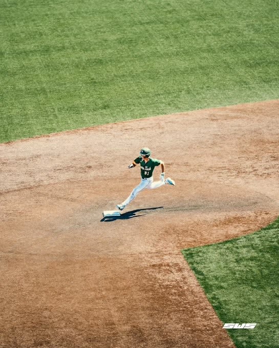 Sebastian Wilson rounding the bases