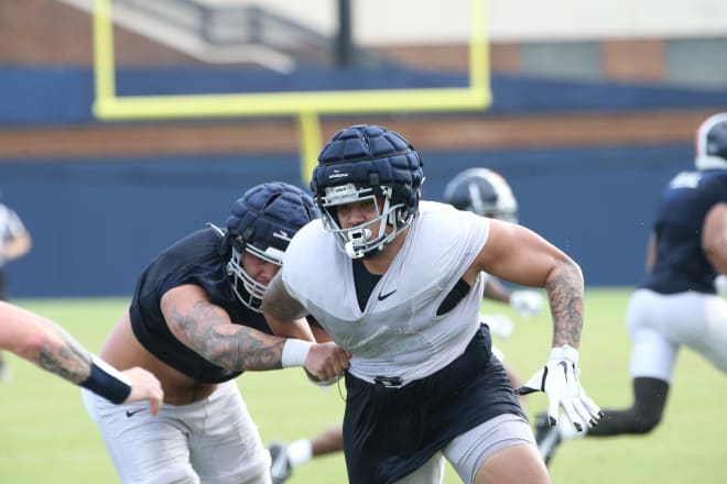 DL Aaron Faumui is back on the field at UVa after opting out of last season.
