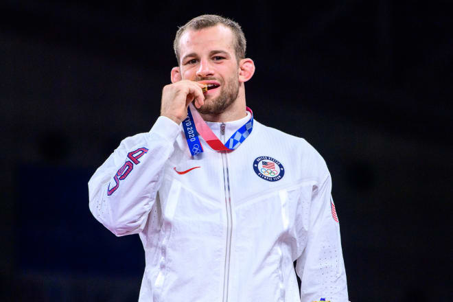 David Taylor stands on the podium with his gold medal after winning the 86 kilogram freestyle wrestling bracket at the Tokyo Olympics earlier this month. Photo courtesy of UWW.